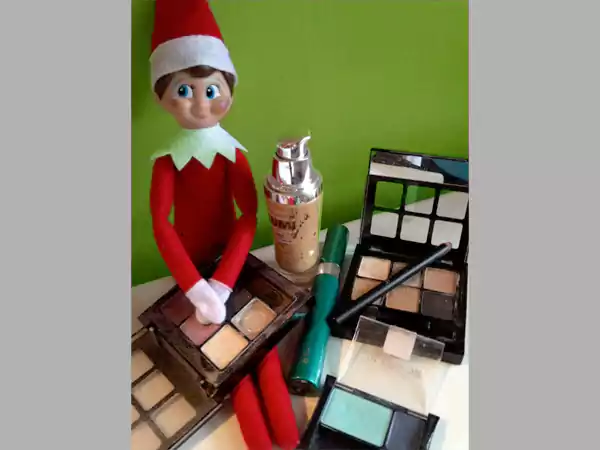 Elf using girls’ makeup