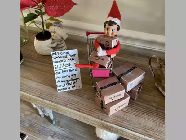 The elf is busy doing shopping