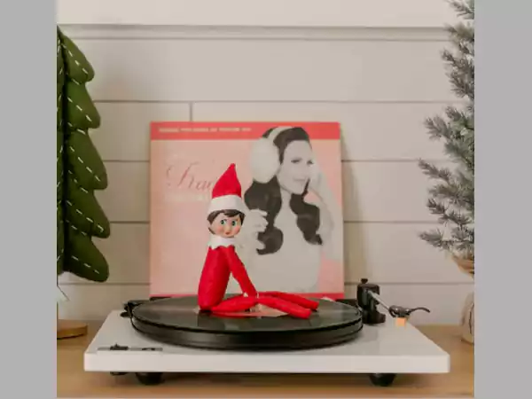 Elf is listening to music