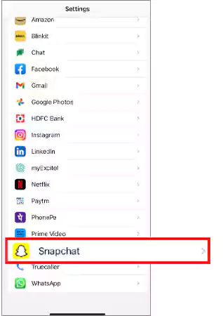 Tap on “Snapchat” to open its settings